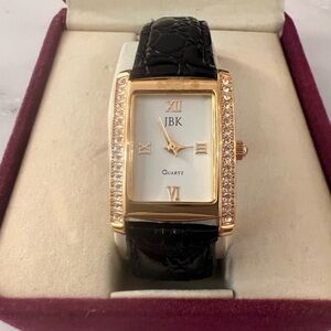 Women's Black and Gold Watch